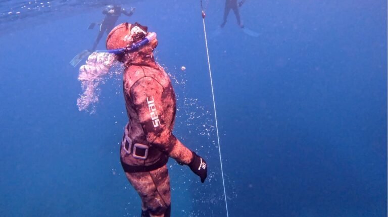 Using the snorkel to exhale just under the surface